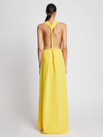 Back full length image of model wearing Matte Crepe Backless Dress in YELLOW