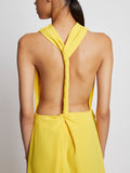 Detail image of model wearing Matte Crepe Backless Dress in YELLOW