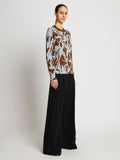 Side full length image of model wearing Floral Silk Jacquard Sweater in FATIGUE MULTI
