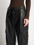 Detail image of model wearing Faux Leather Drawstring Cargo Pants in BLACK