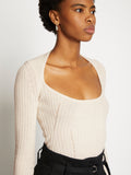 Detail image of model wearing Plaited Rib Scoop Neck Sweater in BONE/PALE CASHEW