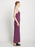 Side full length image of model wearing Lurex Maxi Dress in MAGENTA/SILVER