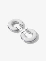 Proenza Schouler Flat lay image of mini hoop earrings in optic white