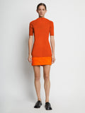 Front full length image of model wearing Compact Viscose Knit Top in TANGERINE