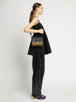 Proenza Schouler image of model wearing Multi Dia Day Bag in truffle/black