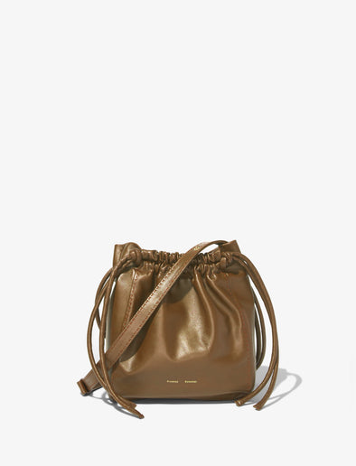 Front image of Drawstring Pouch in TRUFFLE with strap down
