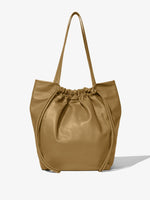 Side image of Drawstring Tote in TRUFFLE