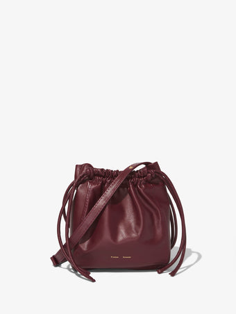 Front image of Drawstring Pouch in DARK RED with straps down