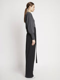Side full length image of model wearing Eco Cashmere Balloon Sleeve Sweater in GREY MELANGE