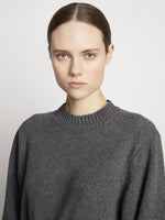 Detail image of model wearing Eco Cashmere Balloon Sleeve Sweater in GREY MELANGE