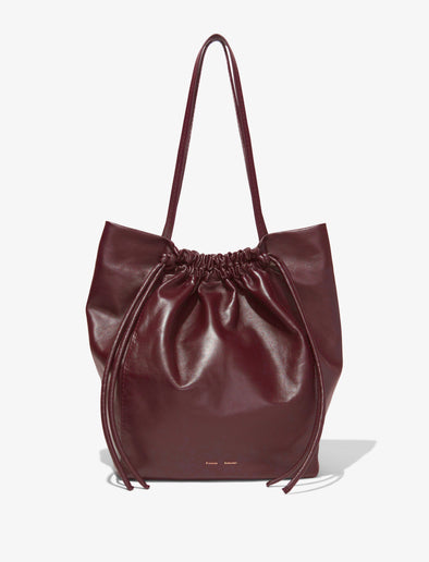 Front image of Drawstring Tote in DARK RED