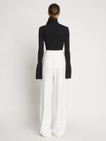 Proenza Schouler back image of model wearing Viscose Rib Zip Sweater in black