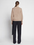 Back image of model wearing Eco Cashmere Balloon Sleeve Sweater in OATMEAL