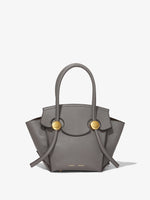 Front image of Small Grainy Leather Pipe Bag in STONE