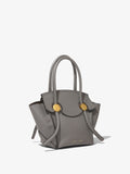 Side image of Small Grainy Leather Pipe Bag in STONE