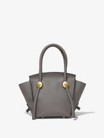 Back image of Small Grainy Leather Pipe Bag in STONE