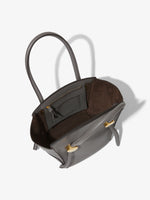Aerial image of Small Grainy Leather Pipe Bag in STONE