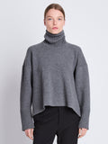 Front cropped image of model wearing Doubleface Eco Cashmere Oversized Turtleneck Sweater in GREY MELANGE