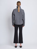 Back image of model wearing Doubleface Eco Cashmere Oversized Turtleneck Sweater in GREY MELANGE