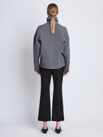 Back image of model wearing Doubleface Eco Cashmere Oversized Turtleneck Sweater in GREY MELANGE