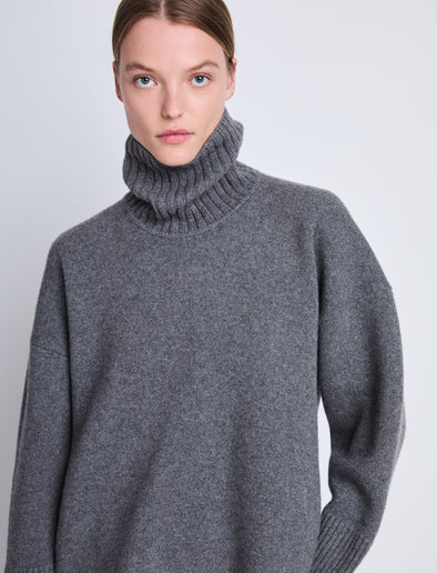 Detail image of model wearing Doubleface Eco Cashmere Oversized Turtleneck Sweater in GREY MELANGE