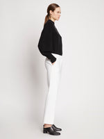 Side full length image of model wearing Bi-Stretch Crepe Pants in OFF WHITE