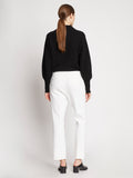 Back full length image of model wearing Bi-Stretch Crepe Pants in OFF WHITE
