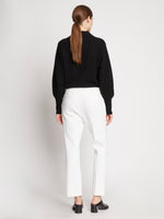 Back full length image of model wearing Bi-Stretch Crepe Pants in OFF WHITE