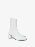 Front 3/4 image of Sculpt Ankle Boots in White