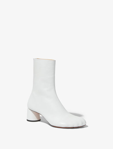 Front 3/4 image of Sculpt Ankle Boots in White