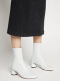 Image of model wearing Sculpt Ankle Boots in White