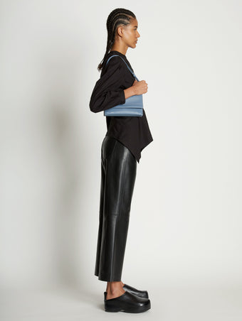 Image of model wearing Small Accordion Flap Bag in DOVE GREY