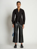 Image of model wearing Small Accordion Flap Bag in DOVE GREY
