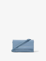 Front image of Small Accordion Flap Bag in DOVE GREY with strap down