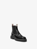 Front 3/4 image of Lug Sole Chelsea Boots in Black