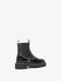Back 3/4 image of Lug Sole Chelsea Boots in Black