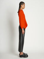 Side full length image of model wearing V-Neck Poplin Top in CHERRY