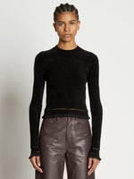 Front cropped image of model wearing Cropped Turtleneck Chenille Sweater in BLACK