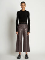 Front full length image of model wearing Cropped Turtleneck Chenille Sweater in BLACK
