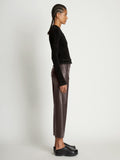 Side full length image of model wearing Cropped Turtleneck Chenille Sweater in BLACK
