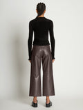 Back full length image of model wearing Cropped Turtleneck Chenille Sweater in BLACK