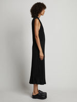 Side full length image of model wearing Pleatable Crepe Drawstring Dress in BLACK