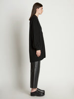 Side full length image of model wearing Cashfeel Cardigan in BLACK