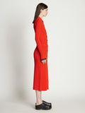 Side full length image of model wearing Rib Knit Button Front Skirt in VERMILLION