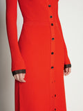 Detail image of model wearing Rib Knit Button Front Skirt in VERMILLION