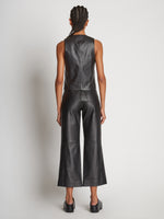 Back full length image of model wearing Leather Vest in BLACK