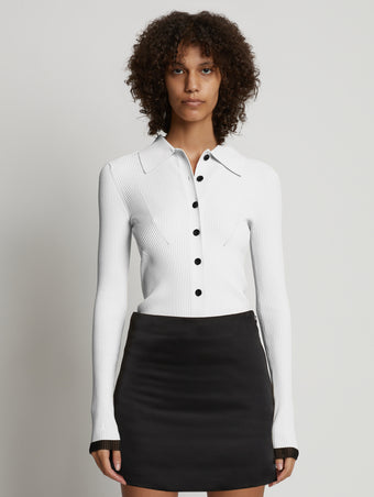 Front cropped image of model wearing Rib Knit Fitted Cardigan in CREAM
