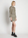 Side full length image of model wearing Cropped Tweed Jacket in YELLOW MULTI
