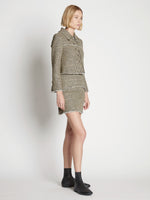Side full length image of model wearing Cropped Tweed Jacket in YELLOW MULTI