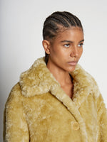 Detail image of model wearing Faux Rabbit Peacoat in SAND